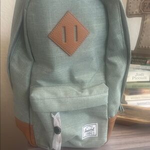 NWT Herschel Supply Company Green inside pockets for phone and more